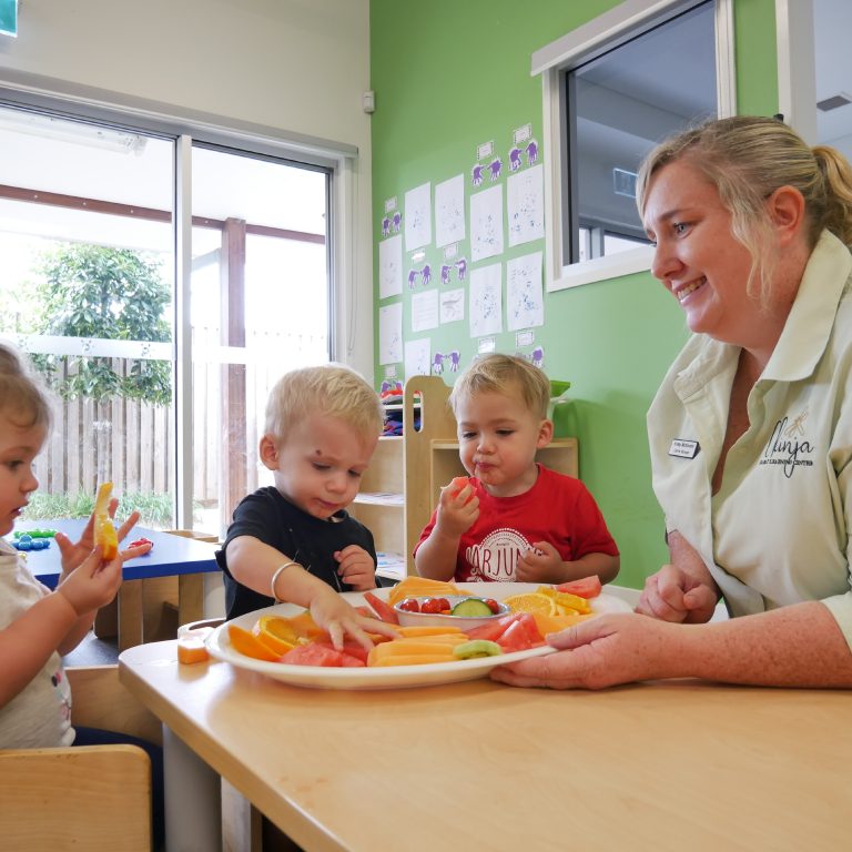 Toddlers having snack at school - Okinja ELC