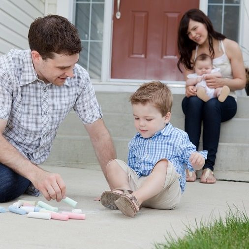 sensory-play-for-babies-father-and-son-playing-on-sidewalk
