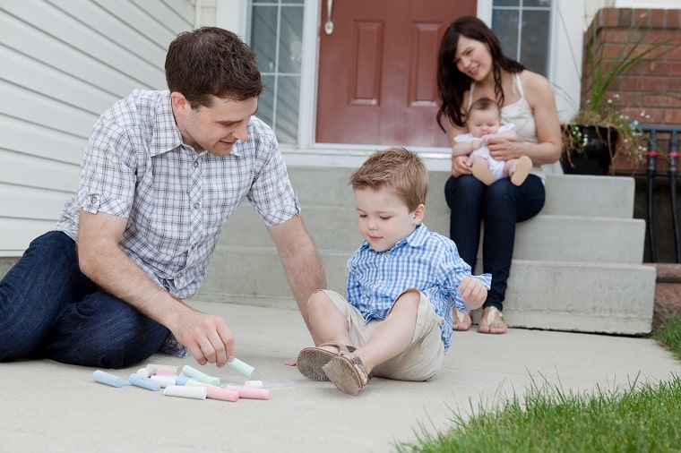 sensory-play-for-babies-father-and-son-playing-on-sidewalk