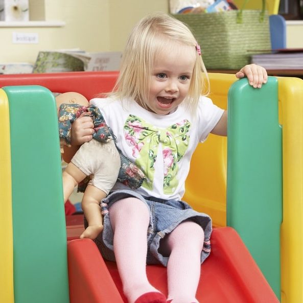 activities for 3-year-olds-young girl playing with toys