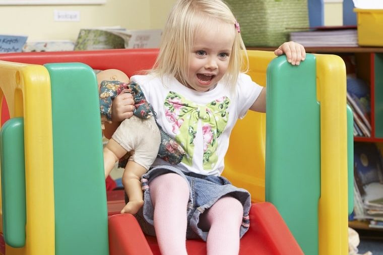 activities for 3-year-olds-young girl playing with toys