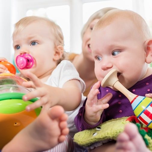 toddlers with toys toddlers with toys