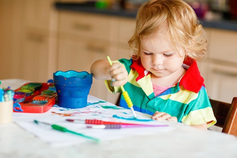 Toddler arts and crafts - little boy painting